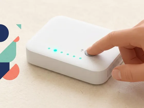 A finger pressing a small button on a white home router with teal indicator lights